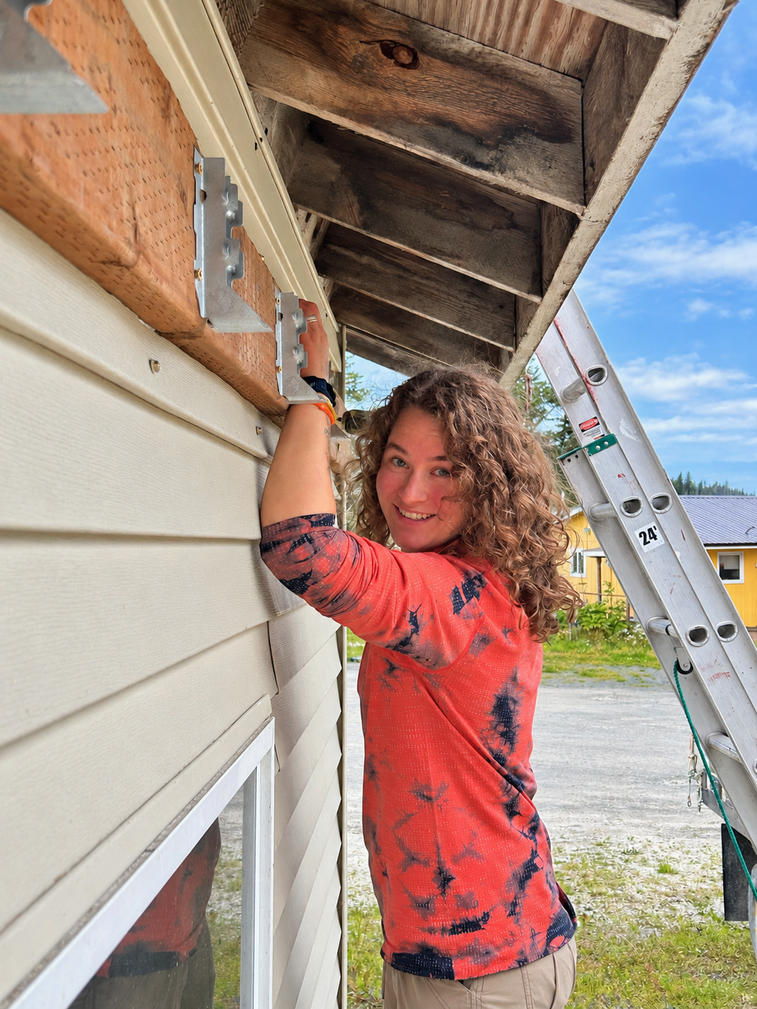 An ABC student working on a building during the Seldovia service trip